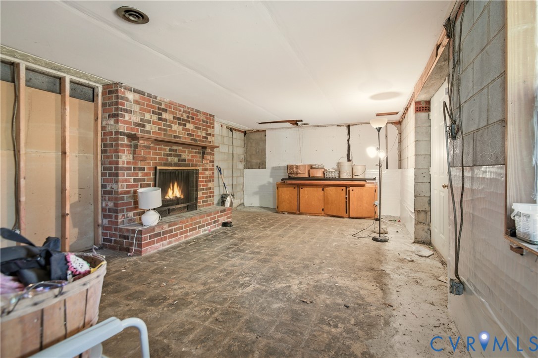 3124 West Hundred Road Chester, VA 23831 - Photo 25 of 28 a view of a livingroom with furniture and a fireplace