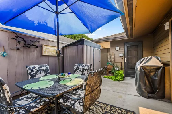 a table and chairs in the patio