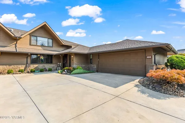a front view of a house with yard