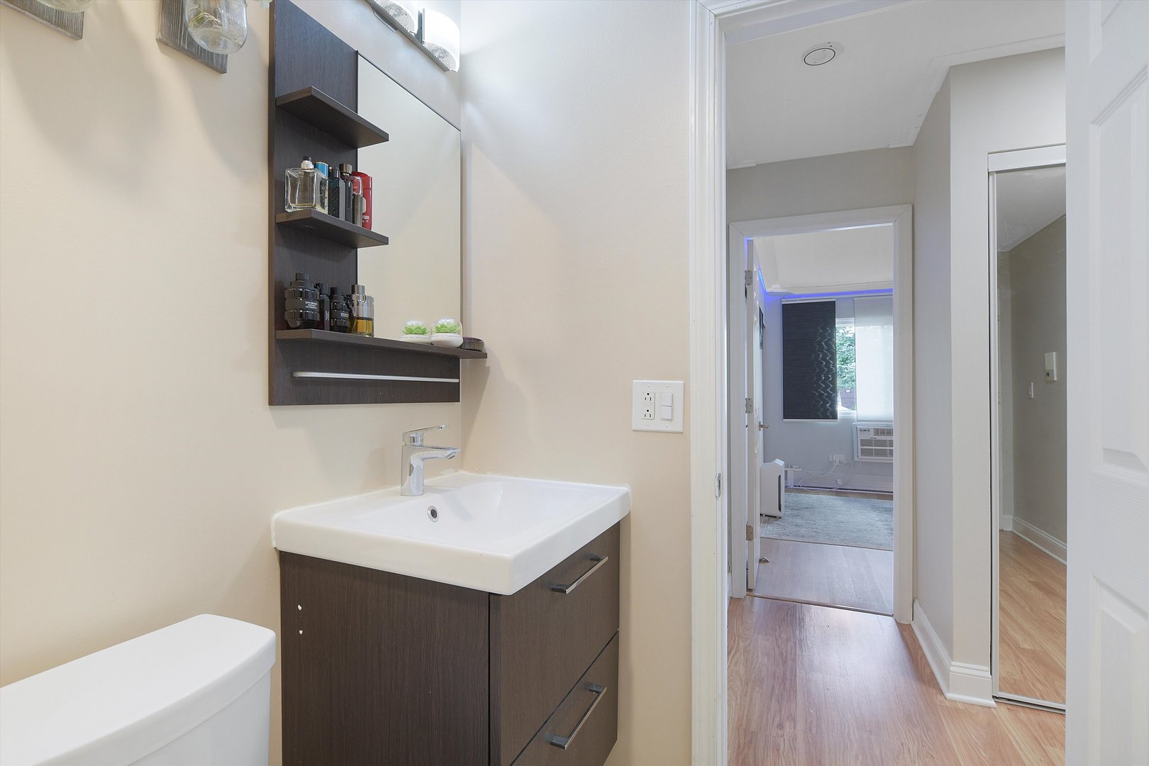 3523 Central Road, Unit 203 Glenview, IL 60025 - Photo 16 of 26 a bathroom with a sink and a mirror