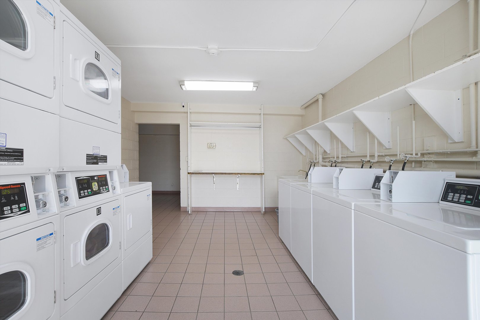 3523 Central Road, Unit 203 Glenview, IL 60025 - Photo 25 of 26 a kitchen with white cabinets and white appliances