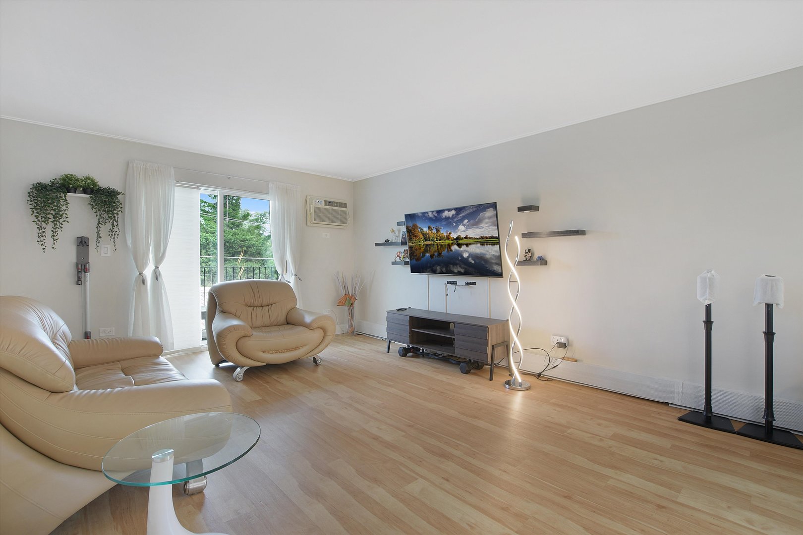 3523 Central Road, Unit 203 Glenview, IL 60025 - Photo 7 of 26 a living room with furniture and a fireplace