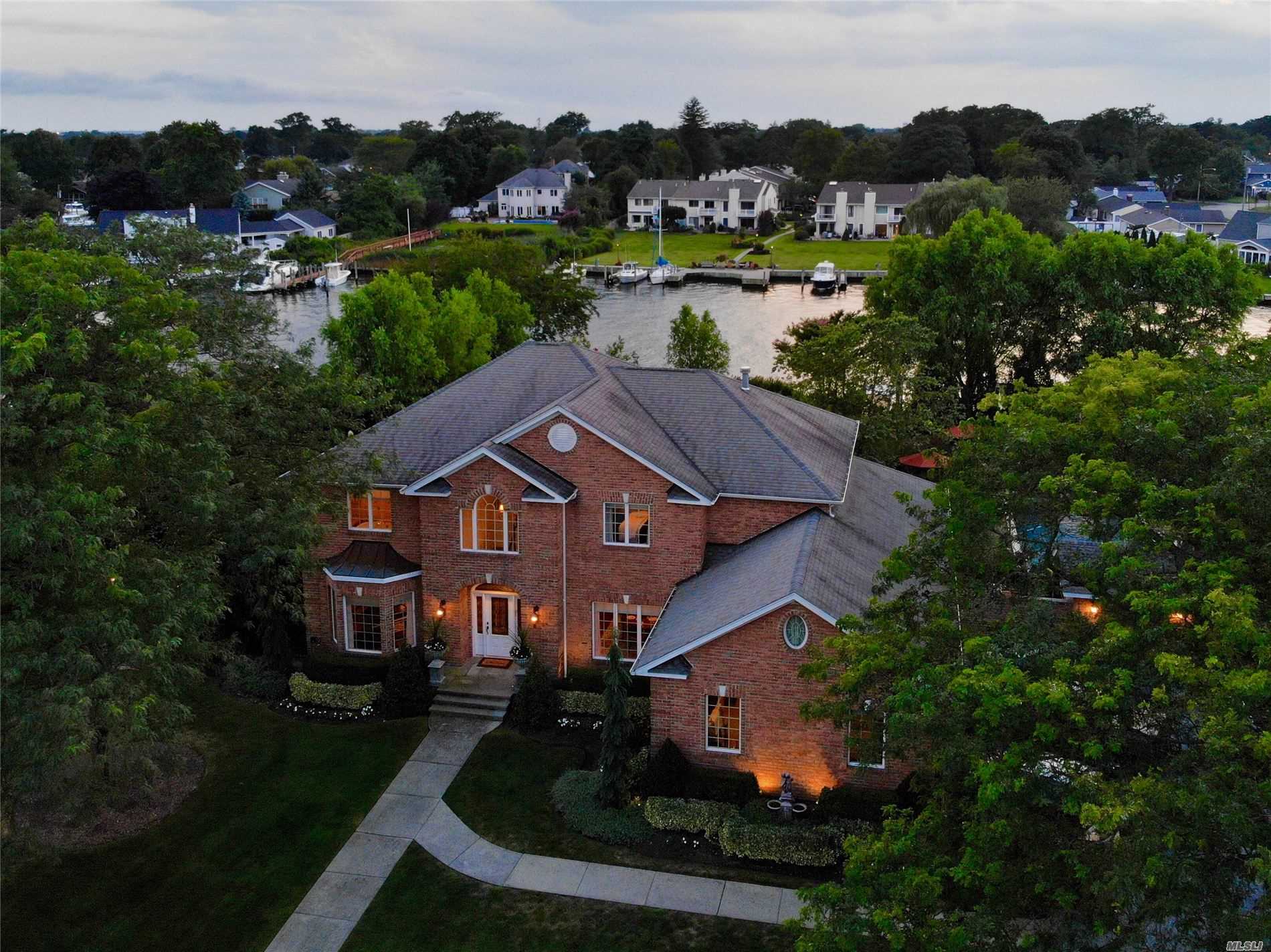 an aerial view of a house with a garden
