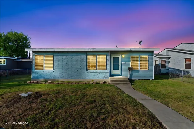 a house view with a garden space