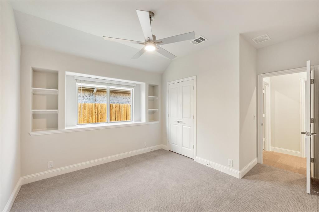 204 Sweetwater Drive Commerce, TX 75428 - Photo 11 of 38 a view of an empty room with a window