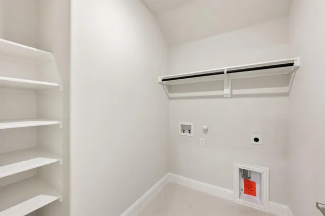 a bathroom with a shower and toilet