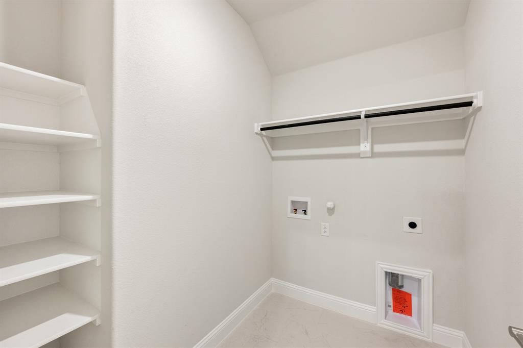 204 Sweetwater Drive Commerce, TX 75428 - Photo 13 of 38 a bathroom with a shower and toilet