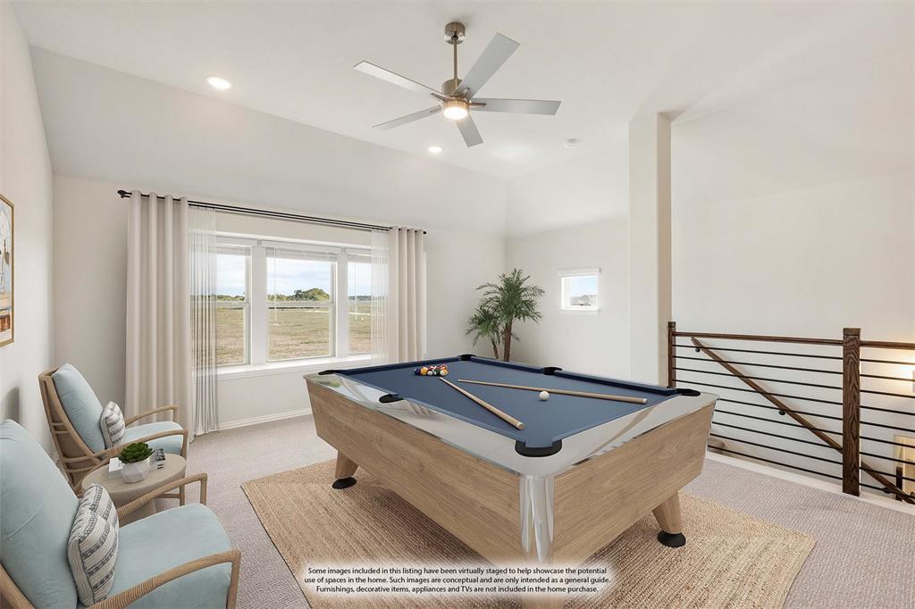 204 Sweetwater Drive Commerce, TX 75428 - Photo 27 of 38 a living room with furniture and ceiling fan