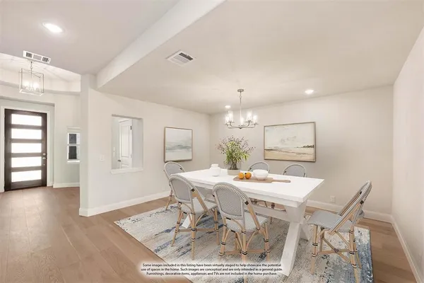 a view of a dining room with furniture