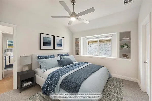 a bedroom with a large bed and a window