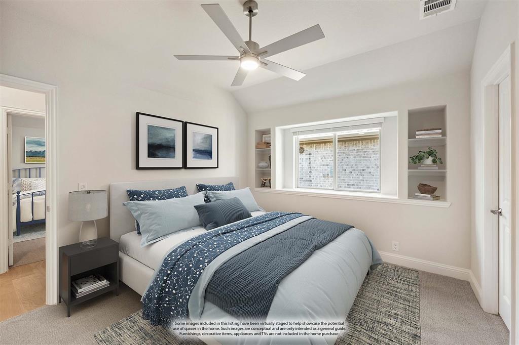 204 Sweetwater Drive Commerce, TX 75428 - Photo 10 of 38 a bedroom with a large bed and a window