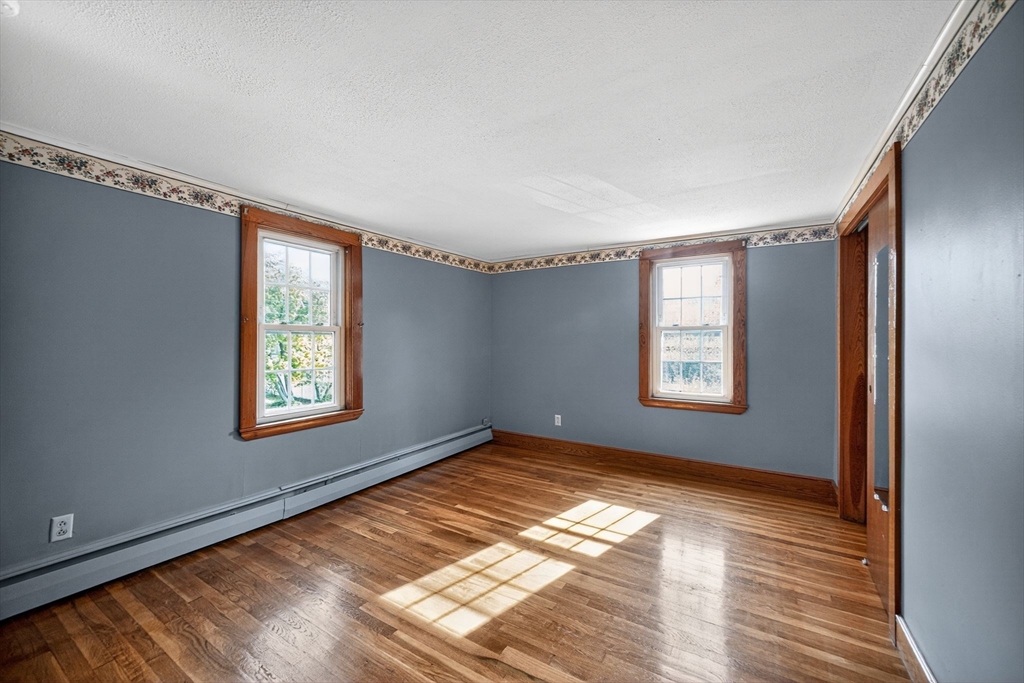 77 Whipple Road Billerica, MA 01821 - Photo 21 of 30 a view of an empty room and window