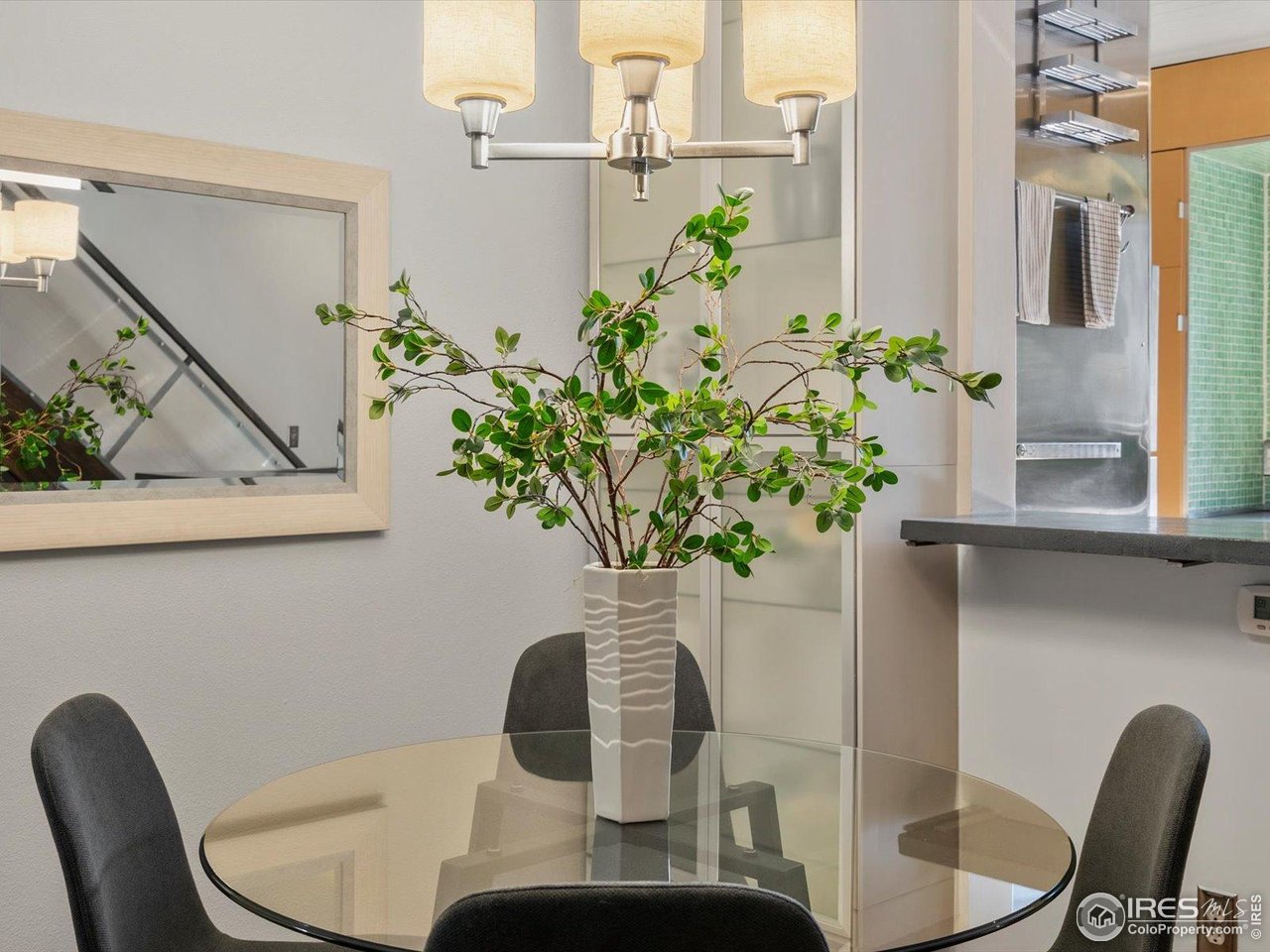 3345 Hickok Place Boulder, CO 80301 - Photo 11 of 34 a vase of flowers sitting on a dining table
