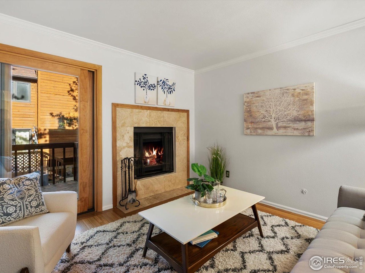 3345 Hickok Place Boulder, CO 80301 - Photo 13 of 34 a living room with furniture and a fireplace