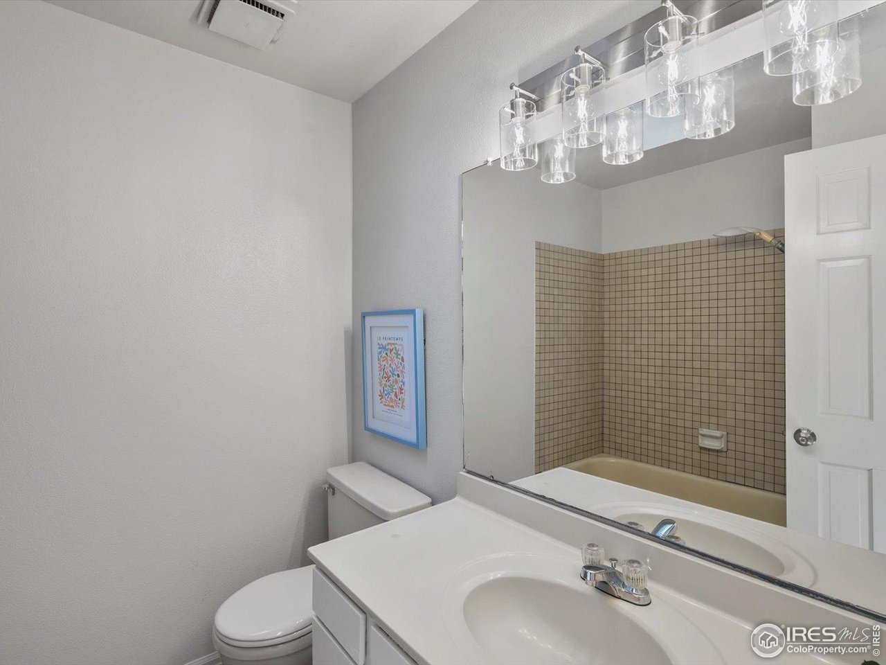 3345 Hickok Place Boulder, CO 80301 - Photo 20 of 34 a bathroom with a sink a toilet and shower