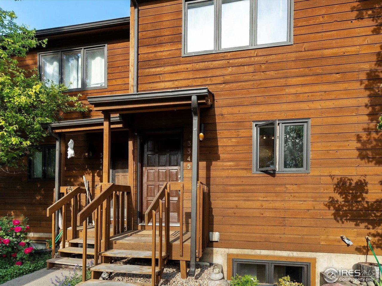 3345 Hickok Place Boulder, CO 80301 - Photo 2 of 34 a view of a house with many windows