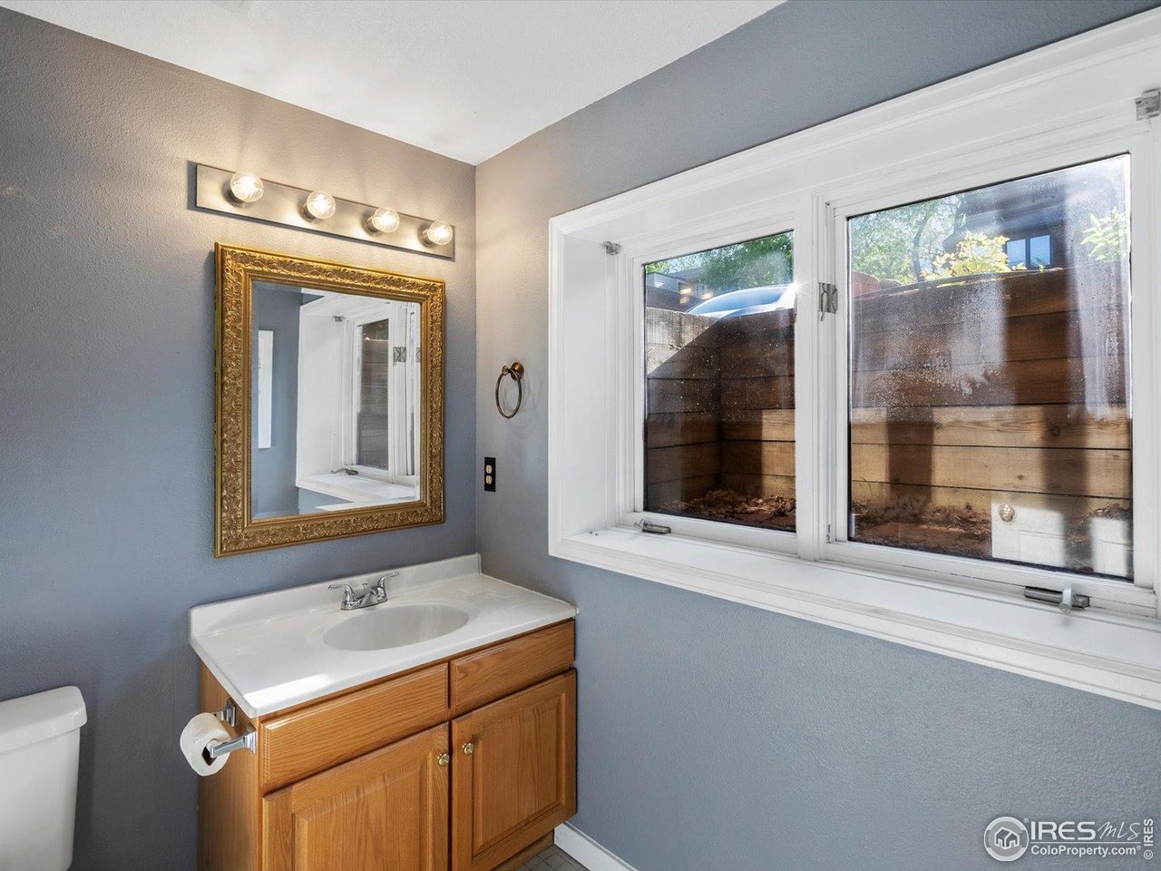 3345 Hickok Place Boulder, CO 80301 - Photo 25 of 34 a bathroom with a sink and a mirror