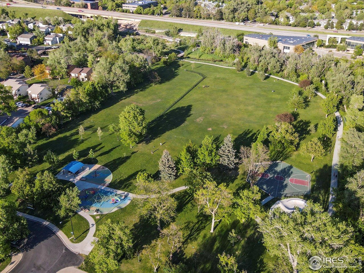 3345 Hickok Place Boulder, CO 80301 - Photo 31 of 34 a view of a lake with a building in the background