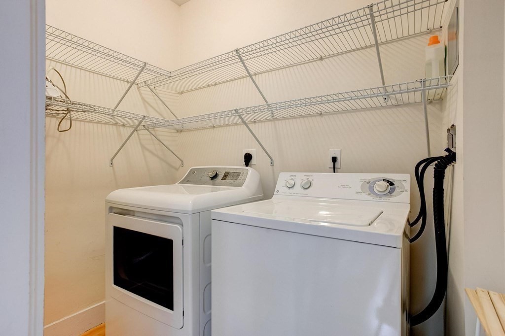 59 Creighton Street, Unit 2 Cambridge, MA 02140 - Photo 23 of 38 a utility room with dryer and washer
