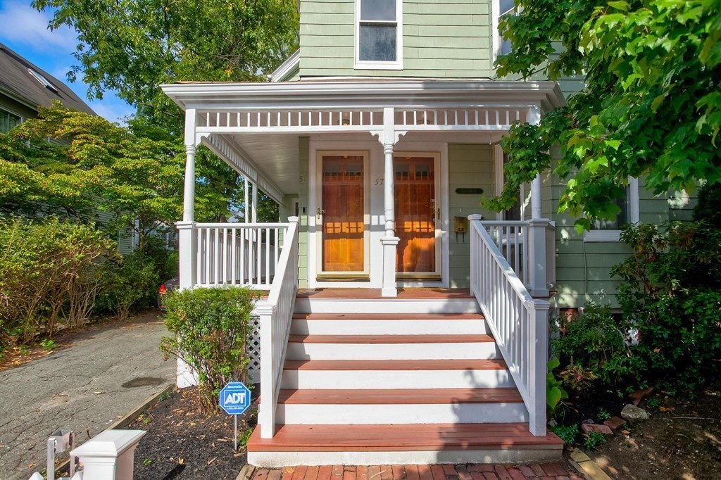 59 Creighton Street, Unit 2 Cambridge, MA 02140 - Photo 4 of 38 a front view of a house with a porch
