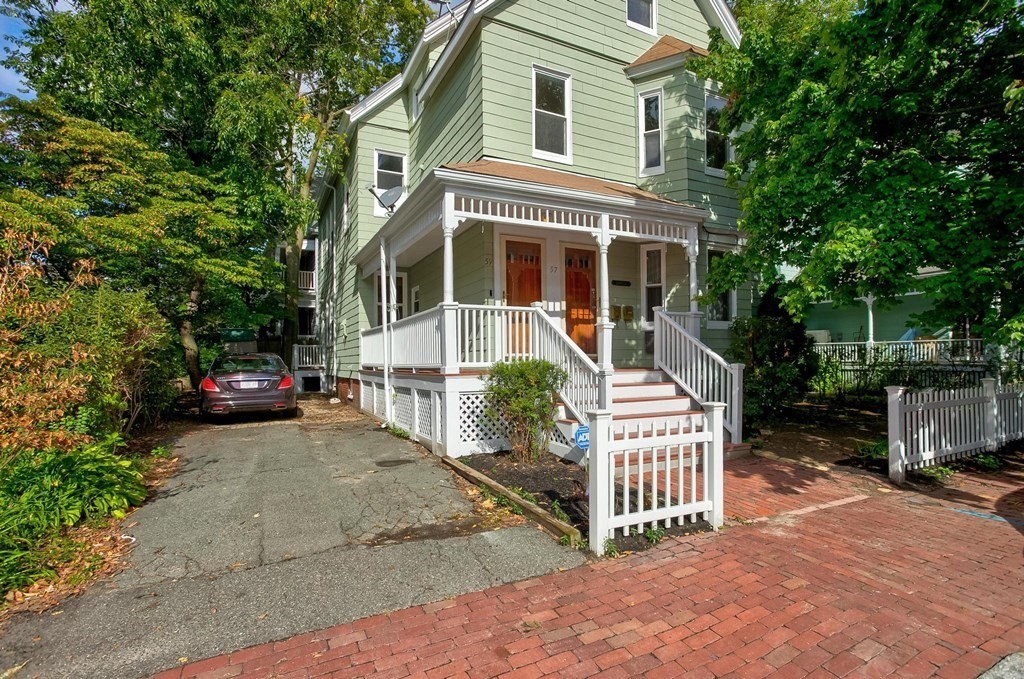 59 Creighton Street, Unit 2 Cambridge, MA 02140 - Photo 5 of 38 a front view of a house with a garden