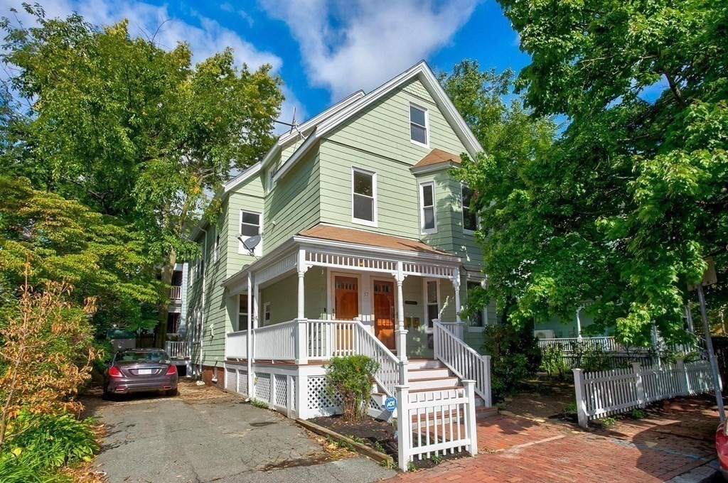 59 Creighton Street, Unit 2 Cambridge, MA 02140 - Photo 9 of 38 a front view of a house with a garden