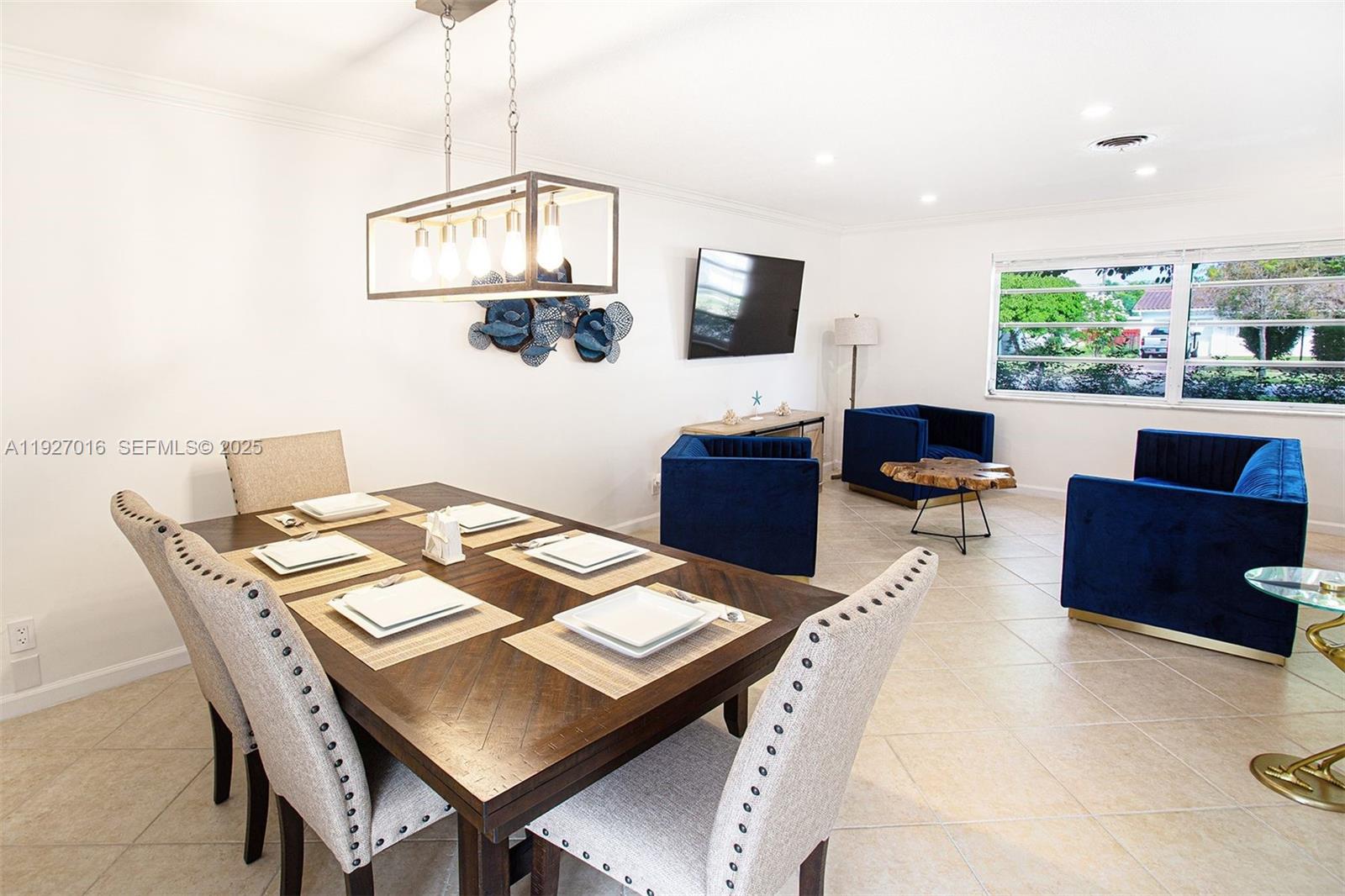 4316 Jackson Street Hollywood, FL 33021 - Photo 11 of 31 a view of a dining room with furniture