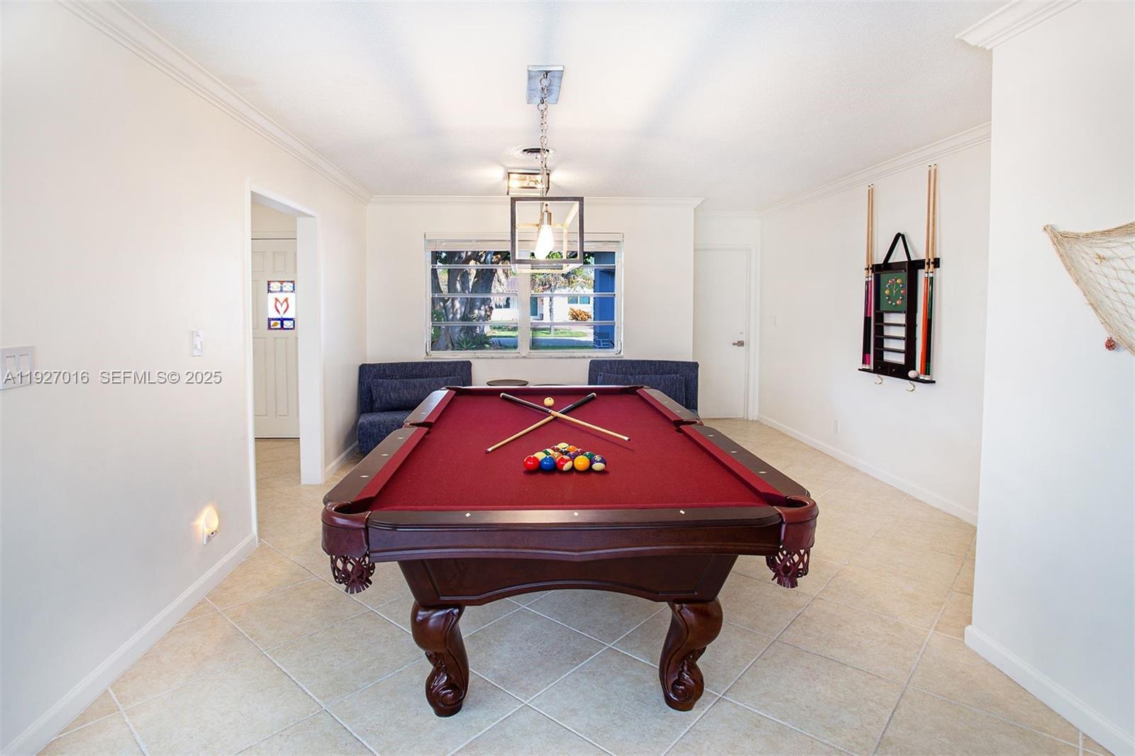 4316 Jackson Street Hollywood, FL 33021 - Photo 13 of 31 a room with pool table and windows