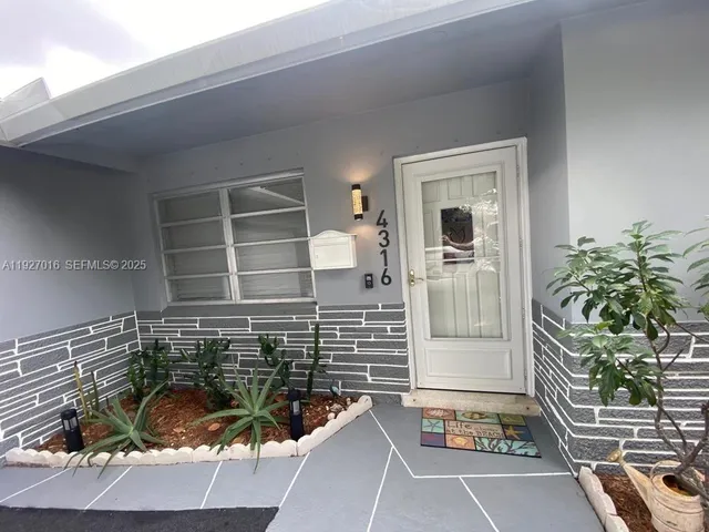 a view of room with a couch