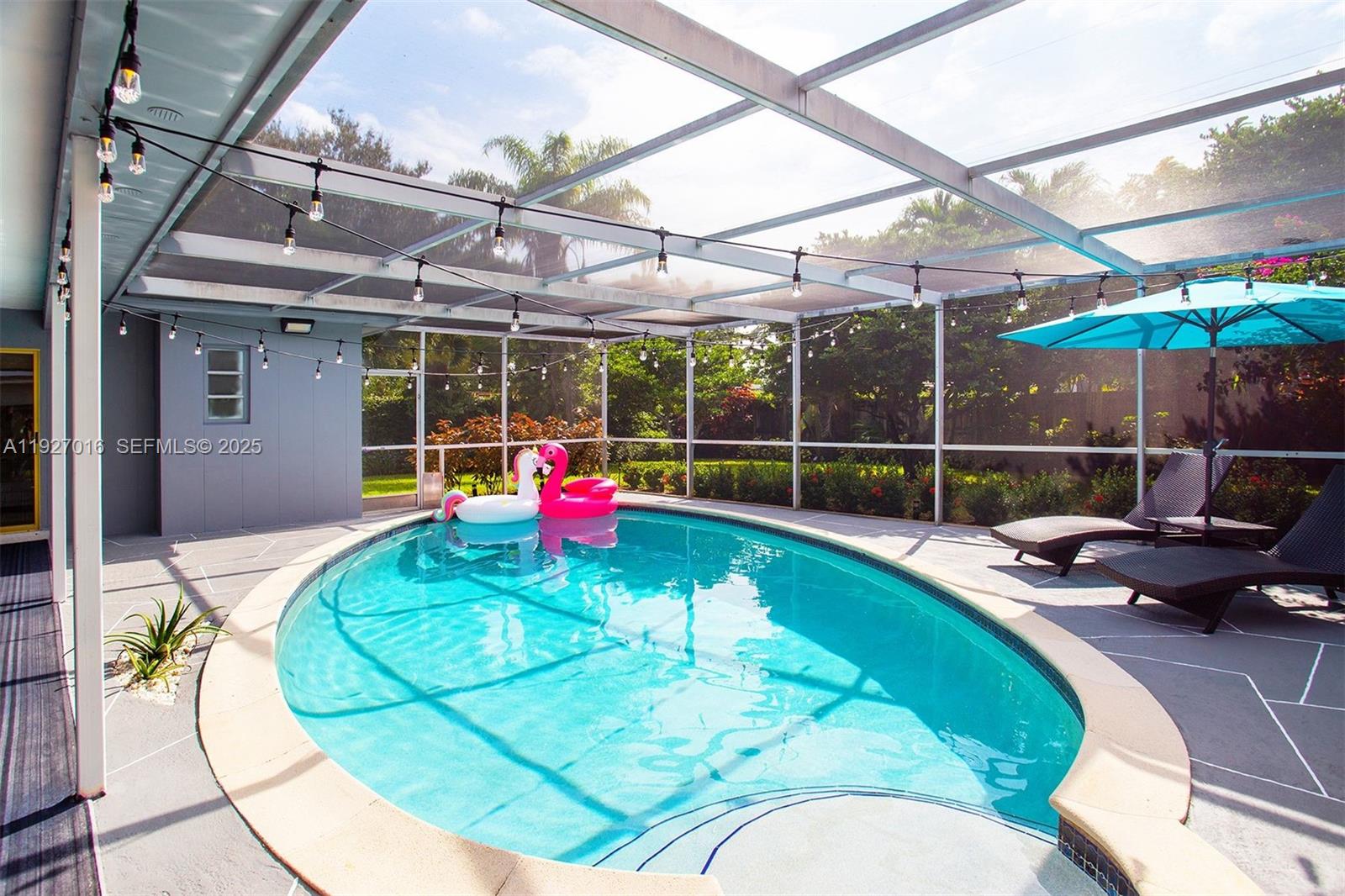4316 Jackson Street Hollywood, FL 33021 - Photo 25 of 31 a view of a chairs and table in a patio