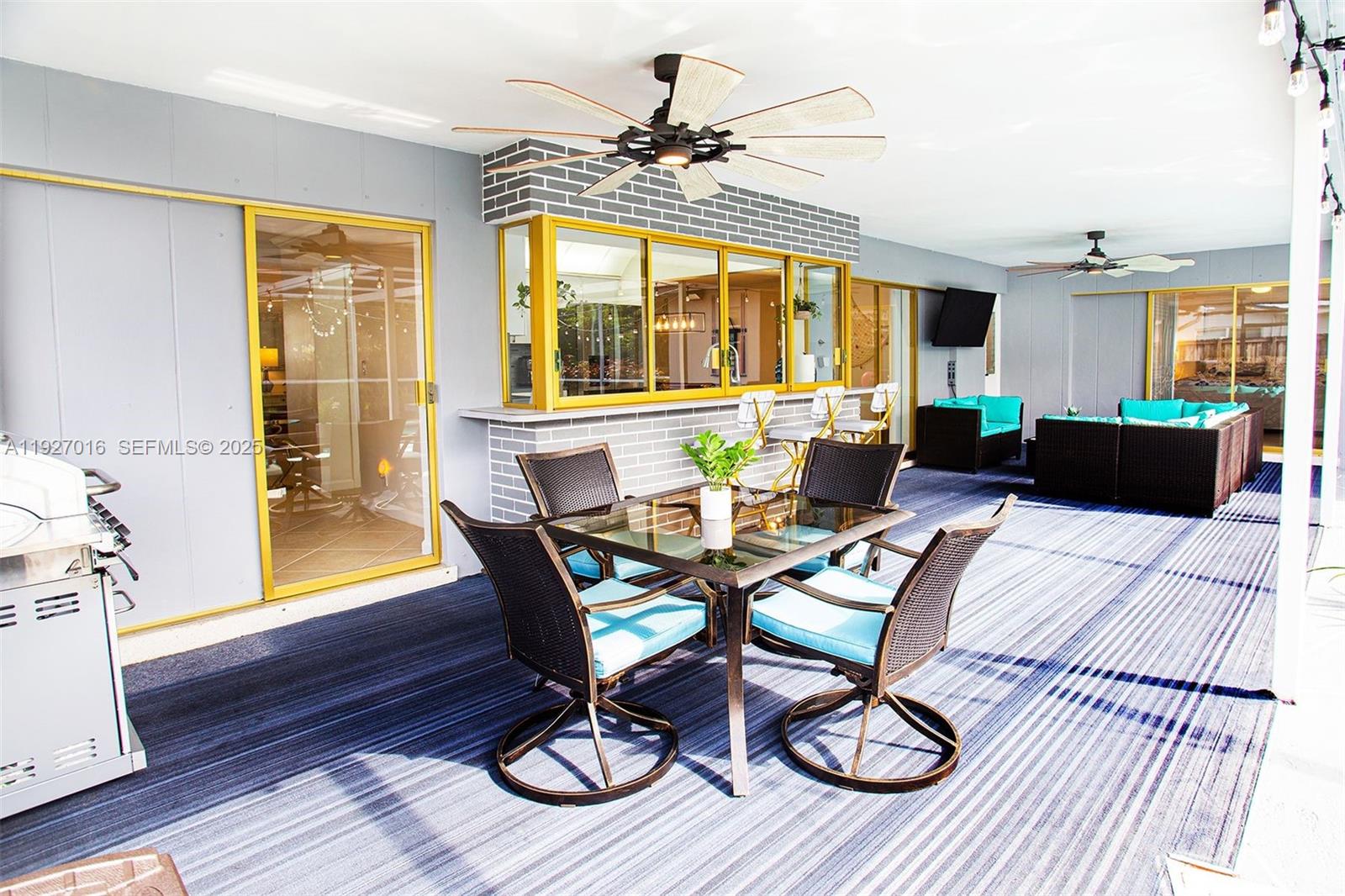 4316 Jackson Street Hollywood, FL 33021 - Photo 4 of 31 a living room with furniture and wooden floor