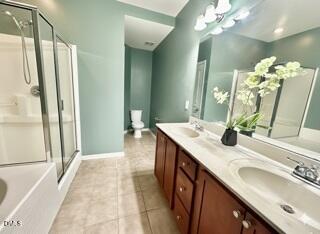 1345 Still Monument Way Raleigh, NC 27603 - Photo 13 of 21 a bathroom with a double vanity sink and a mirror