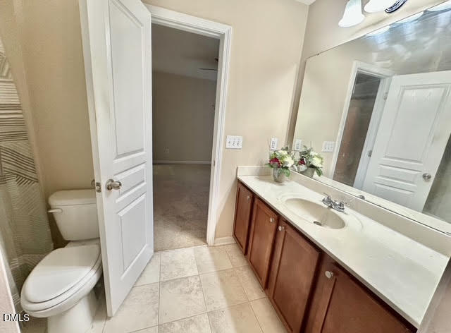 1345 Still Monument Way Raleigh, NC 27603 - Photo 16 of 21 a bathroom with a sink a toilet and shower