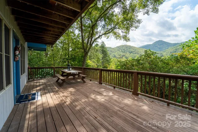 a view of balcony with furniture