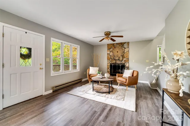 a living room with furniture and a window