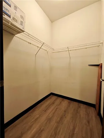 a view of a room with racks on the wall