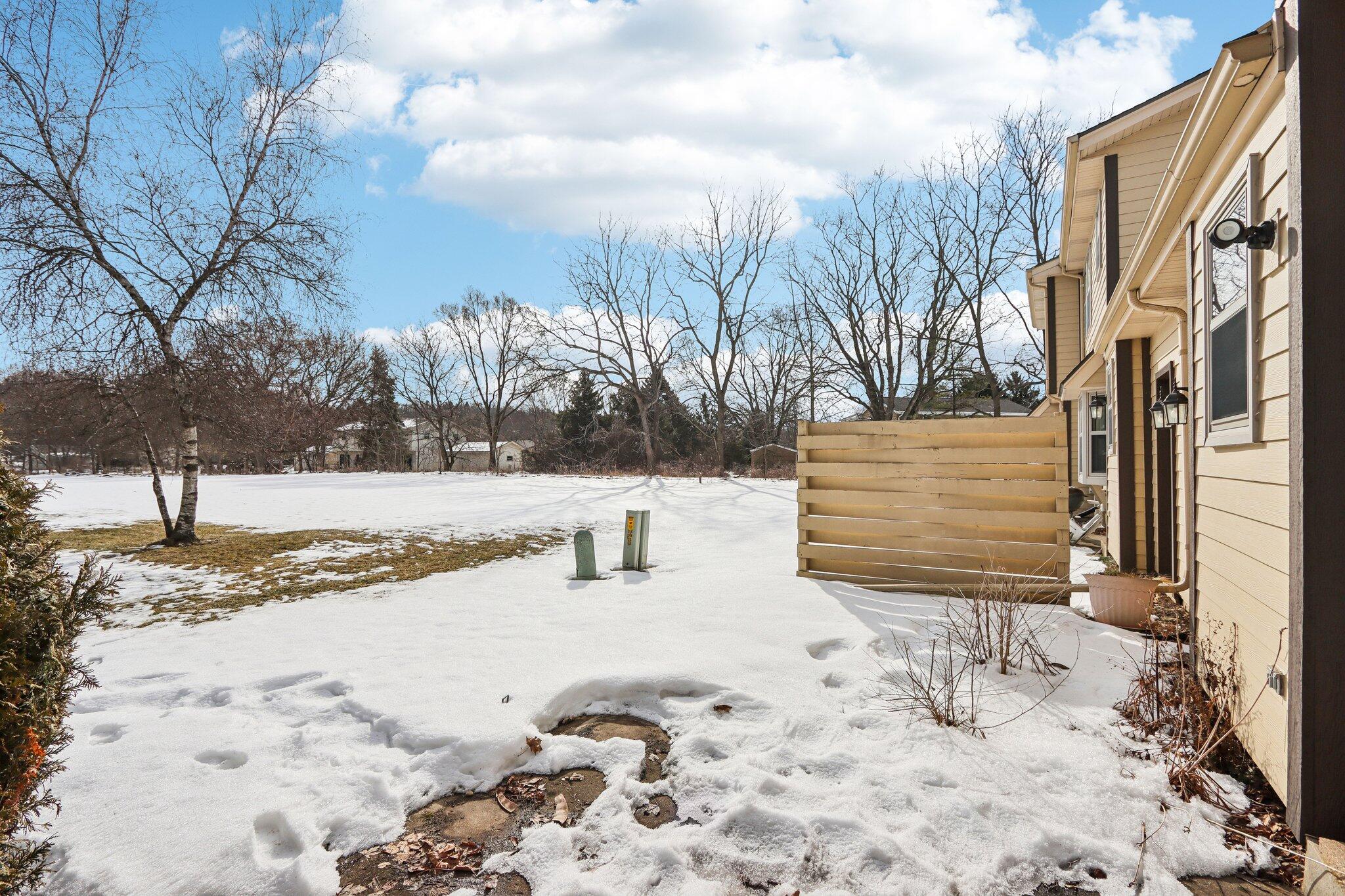 402 South Highland Street, Unit B Wales, WI 53183 - Photo 23 of 30 Rear Patio/Backyard