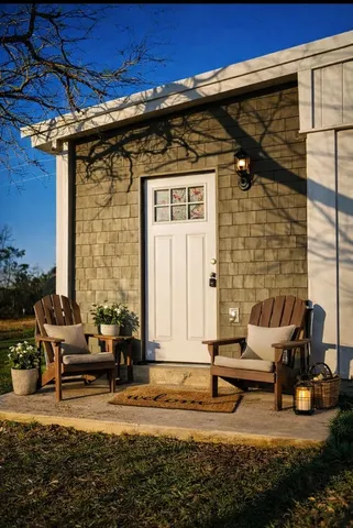 a front view of a house with swimming pool
