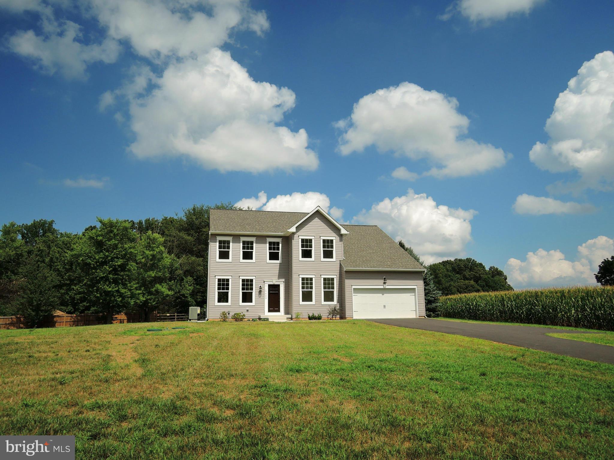 17023 Troyer Road Monkton, MD 21111 - Photo 2 of 30 a view of a big house with a big yard and large trees