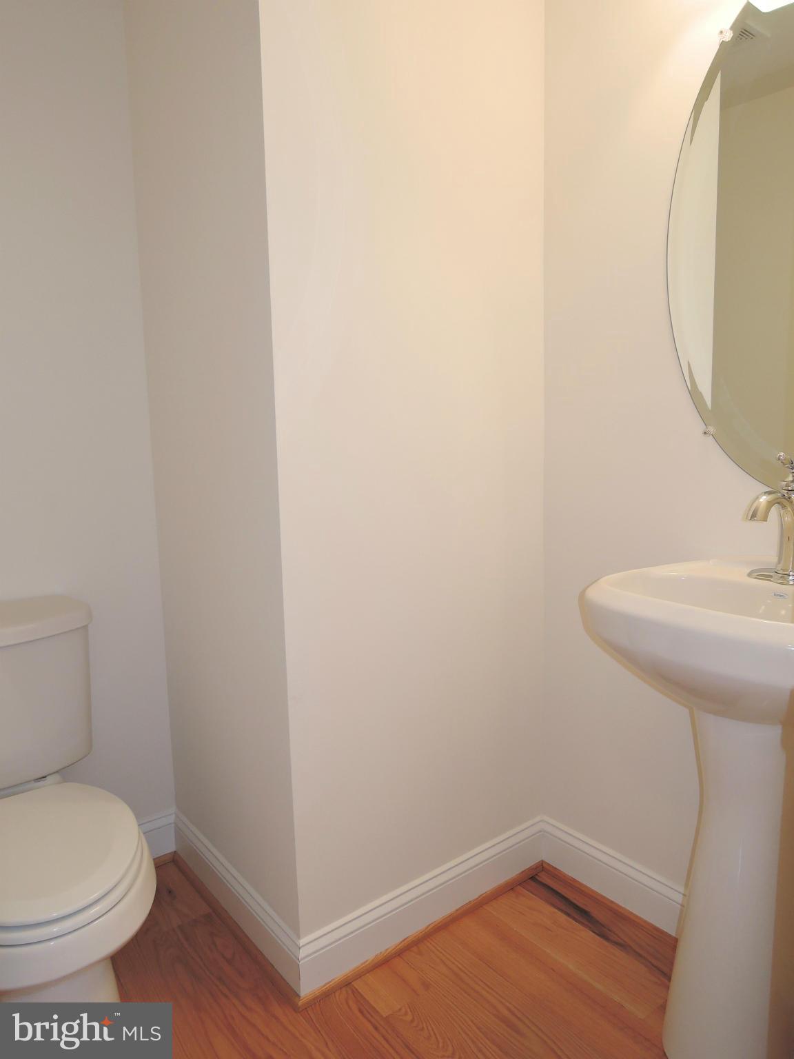 17023 Troyer Road Monkton, MD 21111 - Photo 13 of 30 a bathroom with a sink and a mirror