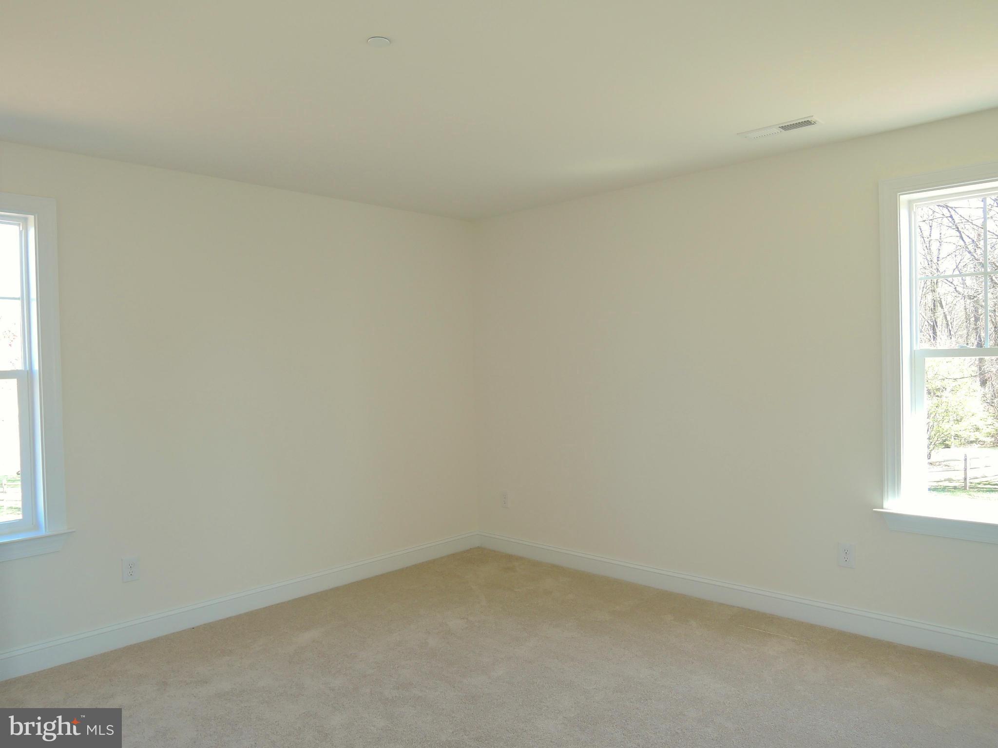 17023 Troyer Road Monkton, MD 21111 - Photo 23 of 30 an empty room with a window