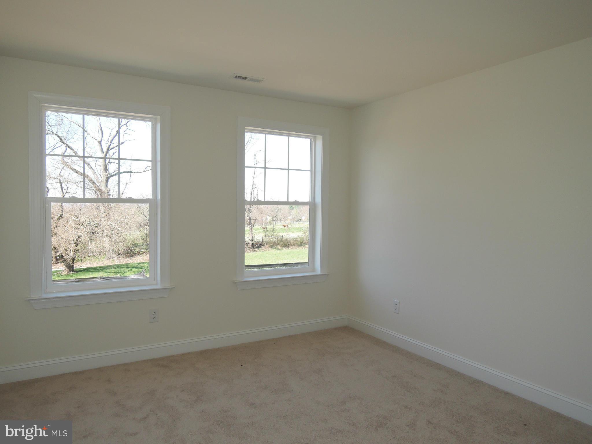17023 Troyer Road Monkton, MD 21111 - Photo 24 of 30 an empty room with a window
