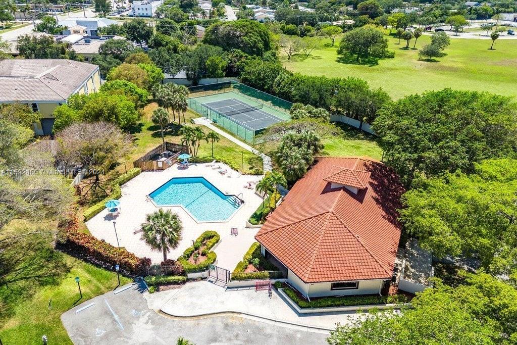 301 Olivewood Place, Unit O229 Boca Raton, FL 33431 - Photo 23 of 25 an aerial view of a house with a yard and lake view