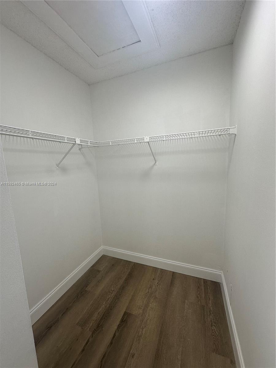 301 Olivewood Place, Unit O229 Boca Raton, FL 33431 - Photo 10 of 25 a view of a room with racks on the wall