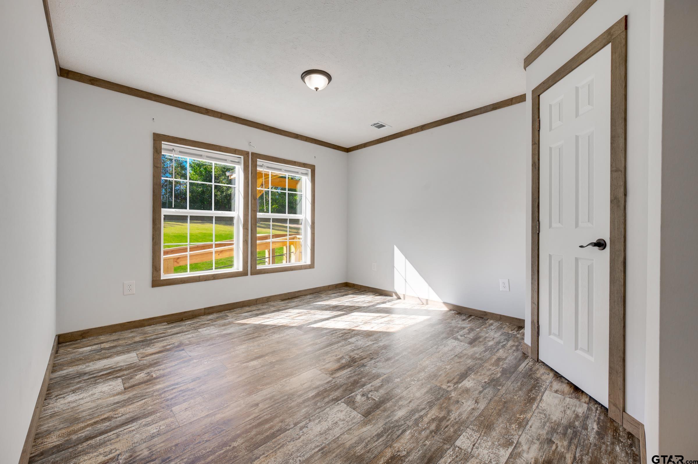 21903 Boles Road Frankston, TX 75763 - Photo 29 of 48 a view of an empty room with a window