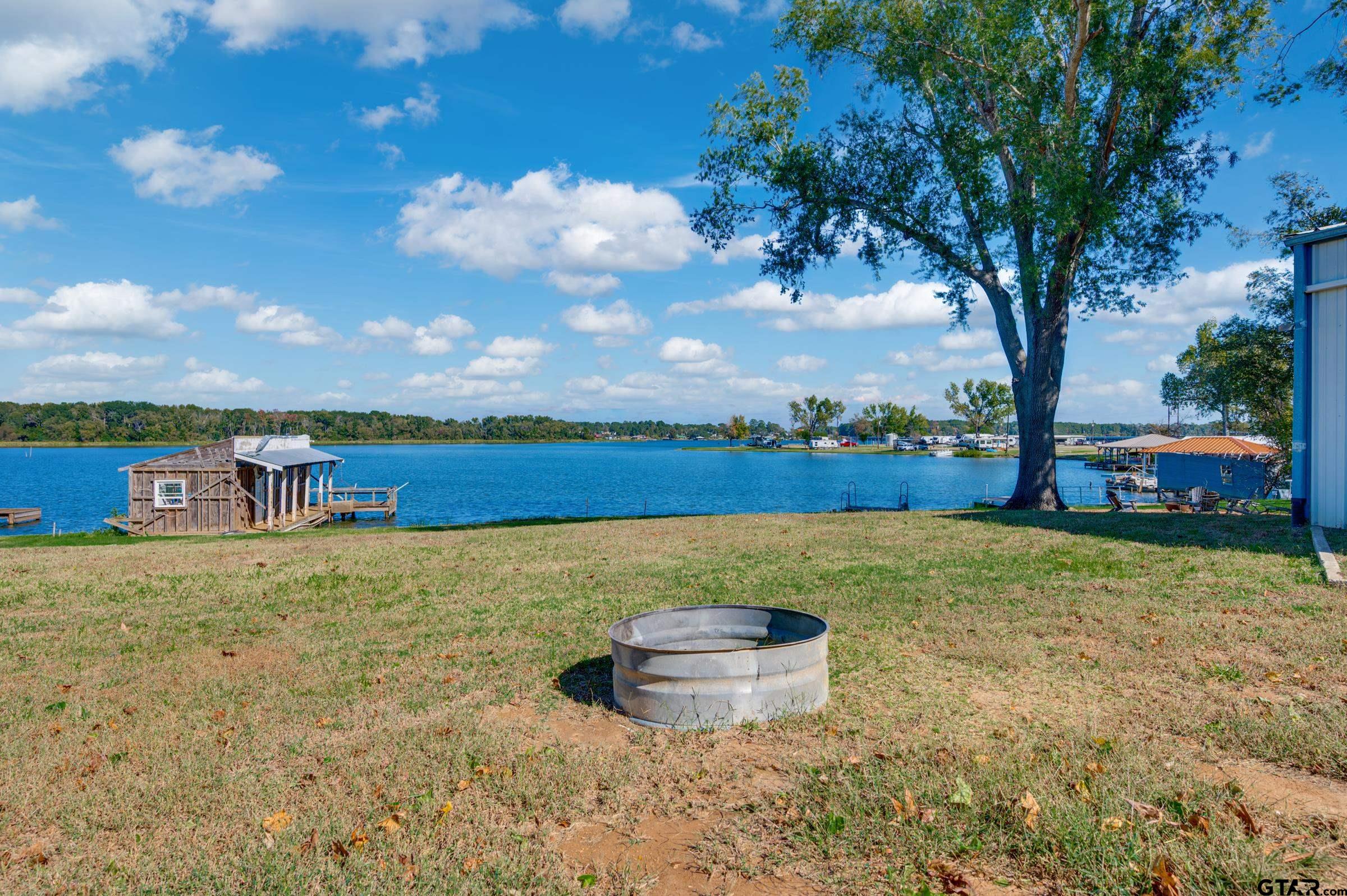 21903 Boles Road Frankston, TX 75763 - Photo 38 of 48 a view of a lake with houses in the back