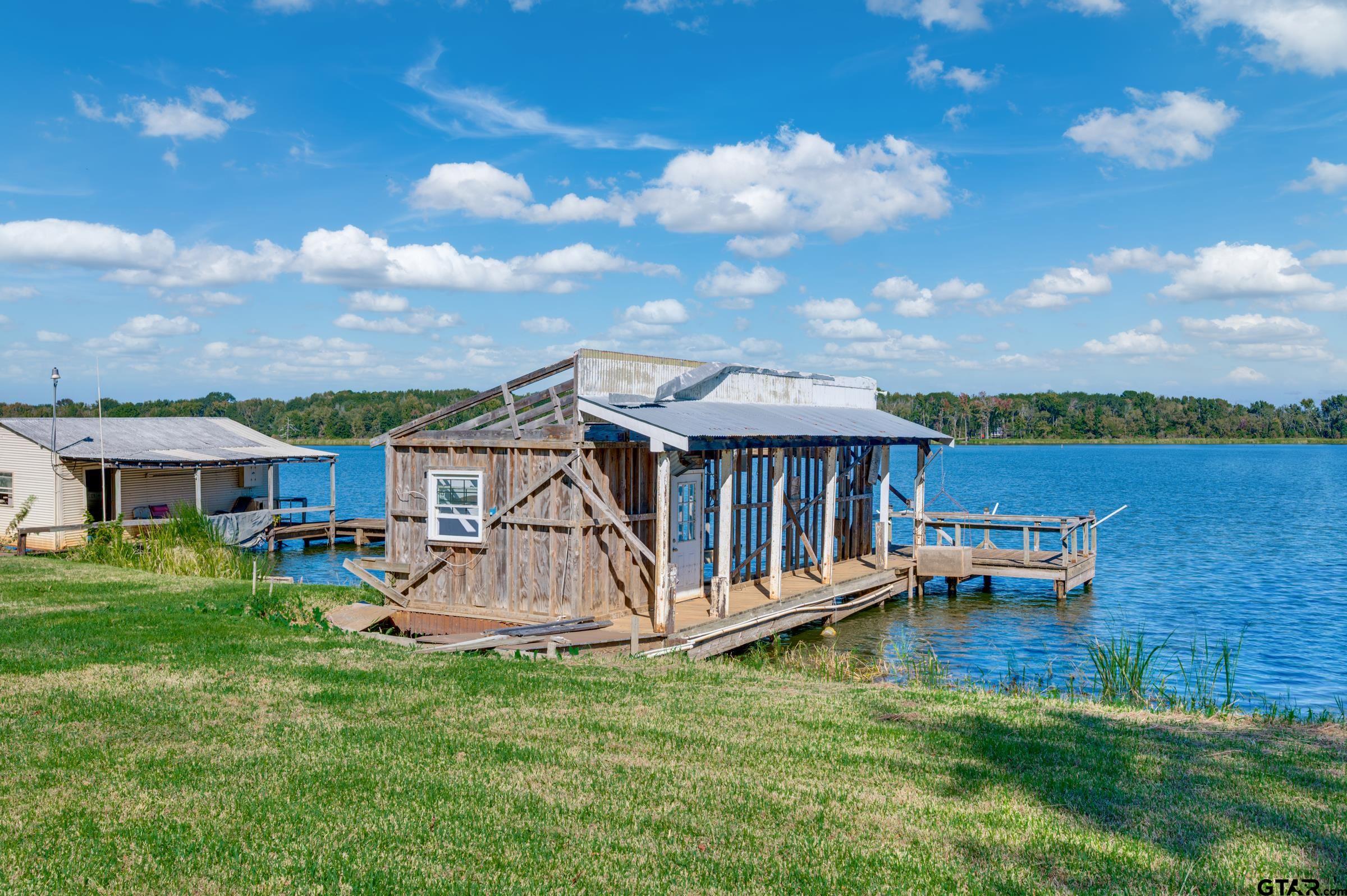 21903 Boles Road Frankston, TX 75763 - Photo 40 of 48 a view of a house with a yard
