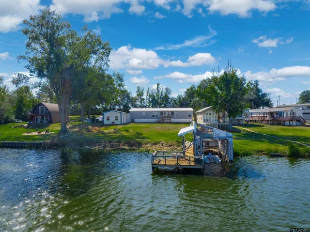 a view of a lake with outdoor space