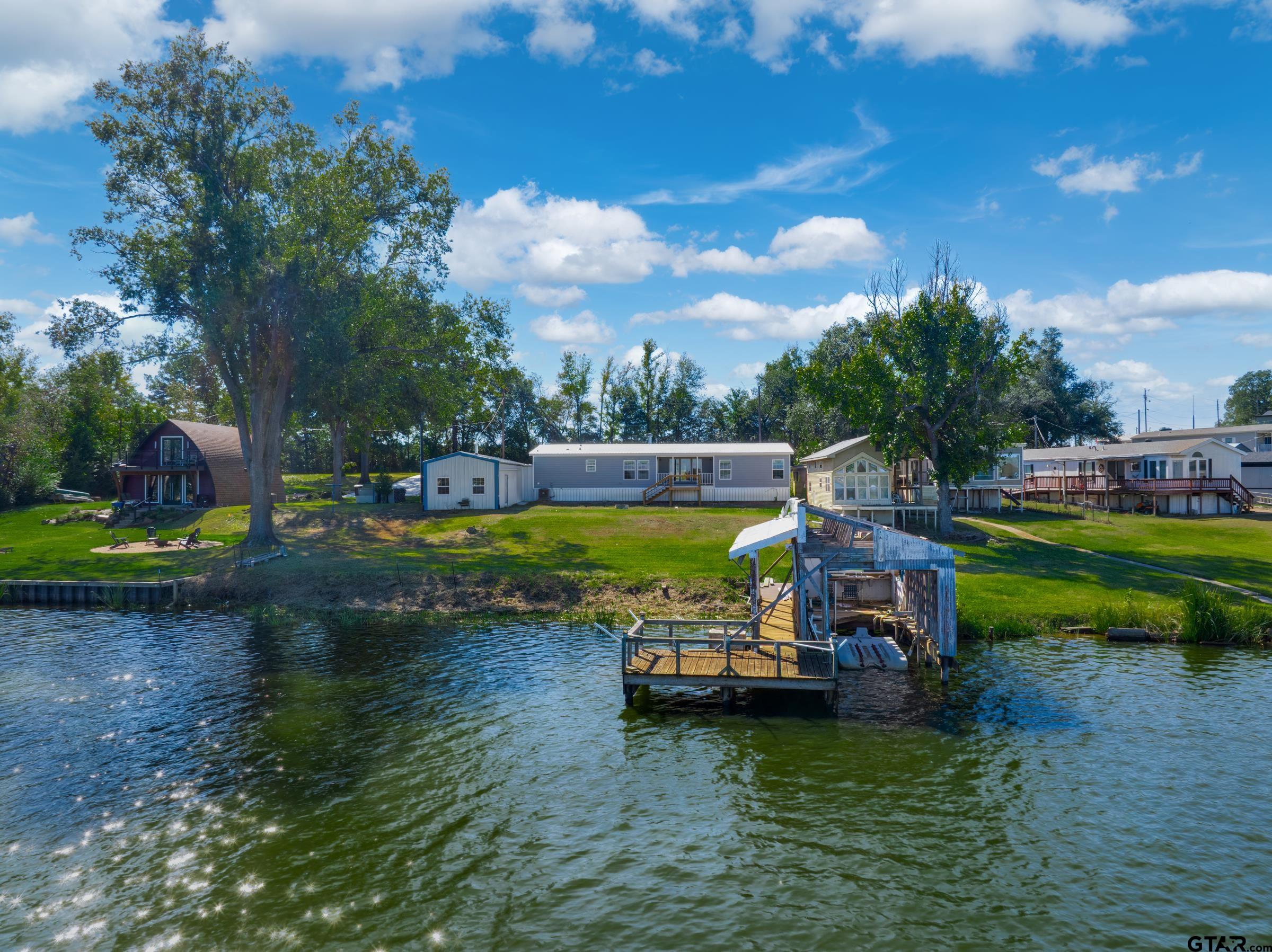 21903 Boles Road Frankston, TX 75763 - Photo 42 of 48 a view of a lake with outdoor space