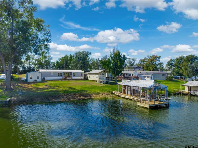 a view of a house with swimming pool